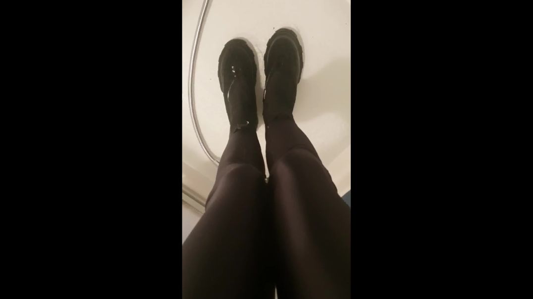 Maria goes to the shower with boots and Adidas socks