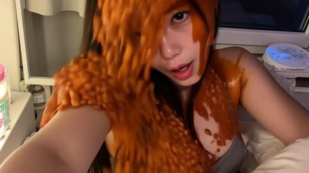 Baked beans poured over girlfriend in bed