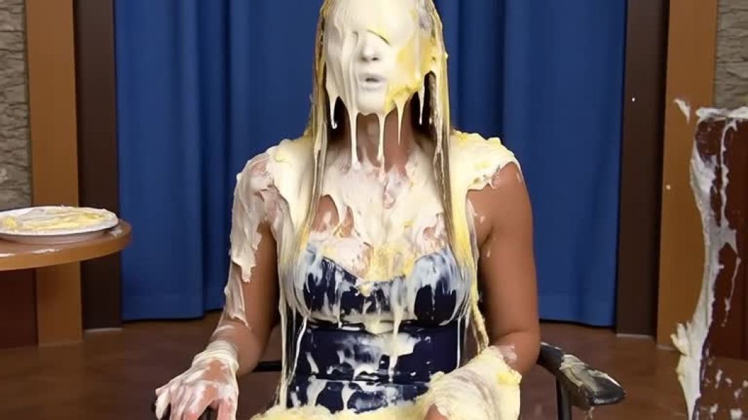 Custard poured over woman