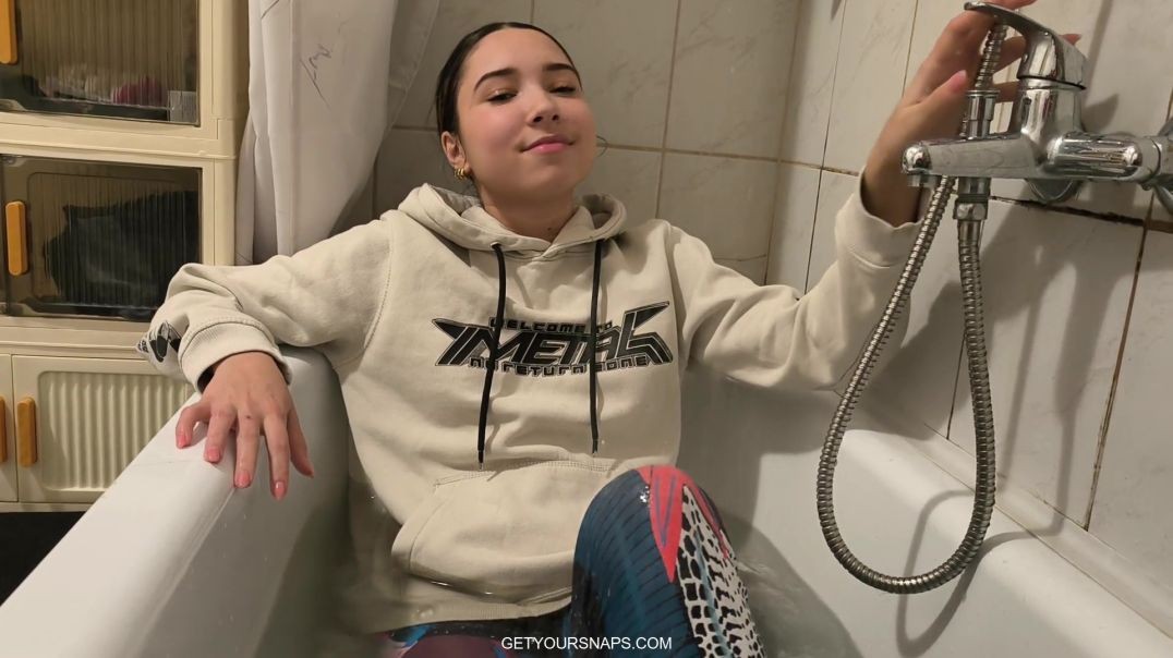Ellie takes a bath in leggings and hoodie - Trailer