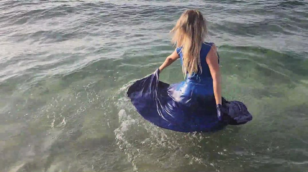 Bella goes swimming in the sea in her blue dress - Trailer